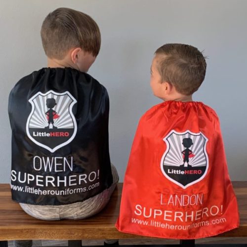 Personalized red superhero cape with embroidered name